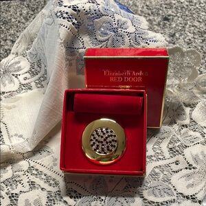 Elizabeth Arden Gold and Red Door collector compact with original box and cover.